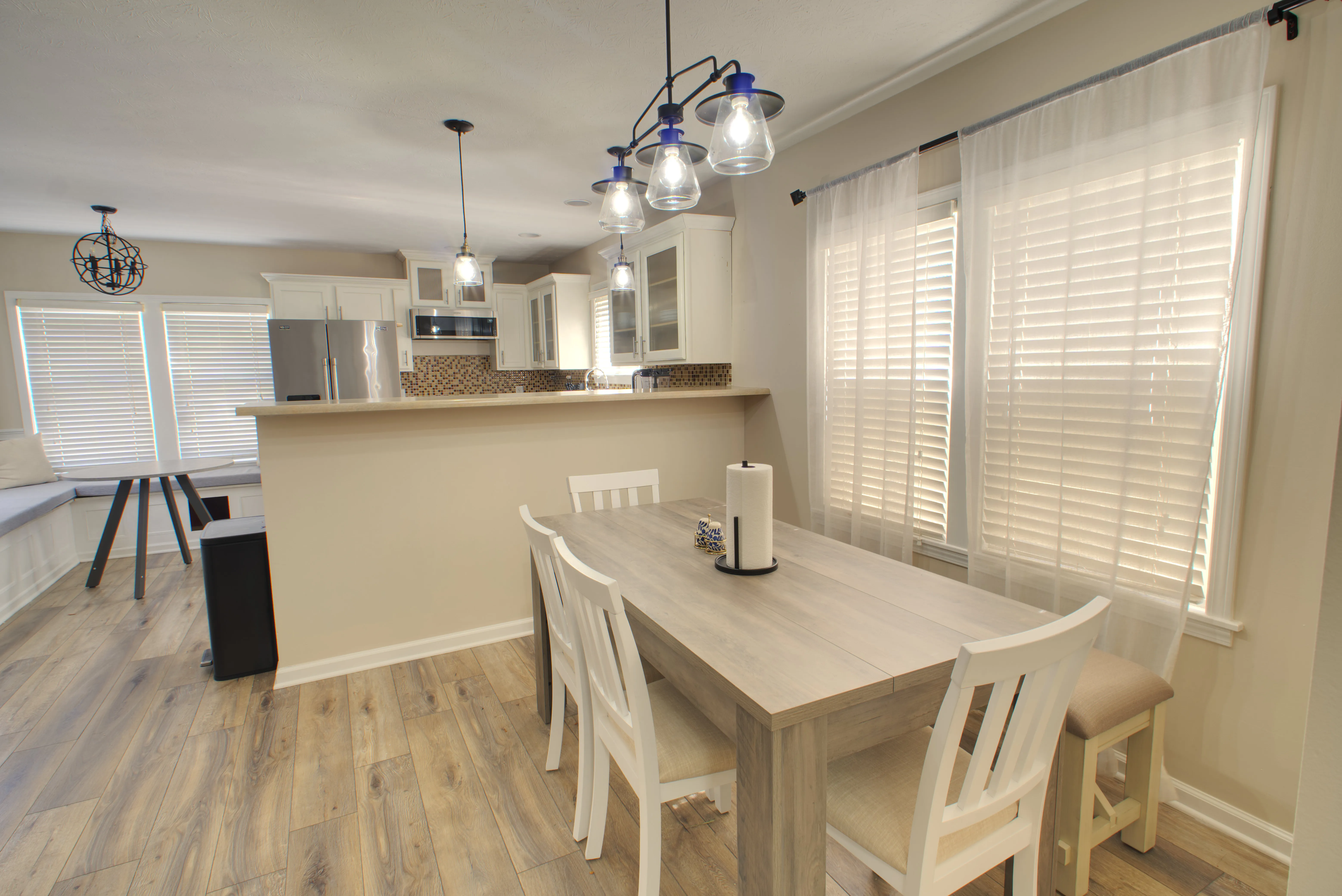 Dining table open to the kitchen
